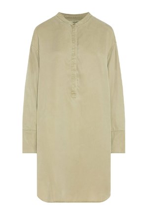 Long-sleeve beige tunic shirt with a round neckline and a short button placket down the front, displayed on a white background.