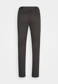 Sorte bukser lavet af bomuld med slim fit. Har to baglommer og en glat tekstur. Hårets afslutning er lige og uden pynt.