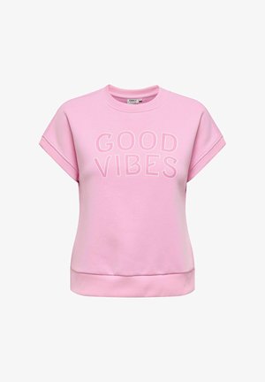 Ανοιχτό ροζ κοντομάνικο φούτερ με ριμπ λαιμόκοψη και τελείωμα. Διαθέτει την επιγραφή "ΚΑΛΕΣ ΔΟΝΗΣΕΙΣ" σε αντίθεση με άσπρη γραμματοσειρά μπροστά.