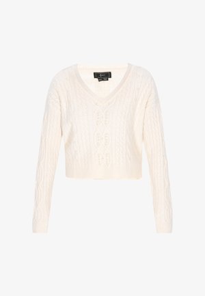 Suéter corto de punto blanco con escote en V y mangas largas. Presenta patrones de punto trenzado y pequeñas perlas decorativas en la parte delantera.