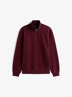 Maroon long-sleeve pullover with quarter zip and small Tommy Hilfiger logo on the left chest, ribbed cuffs and hem.