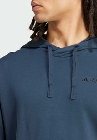 Adidas Terrex TX LOGO HOODY - Jersey con capucha - aurora ink