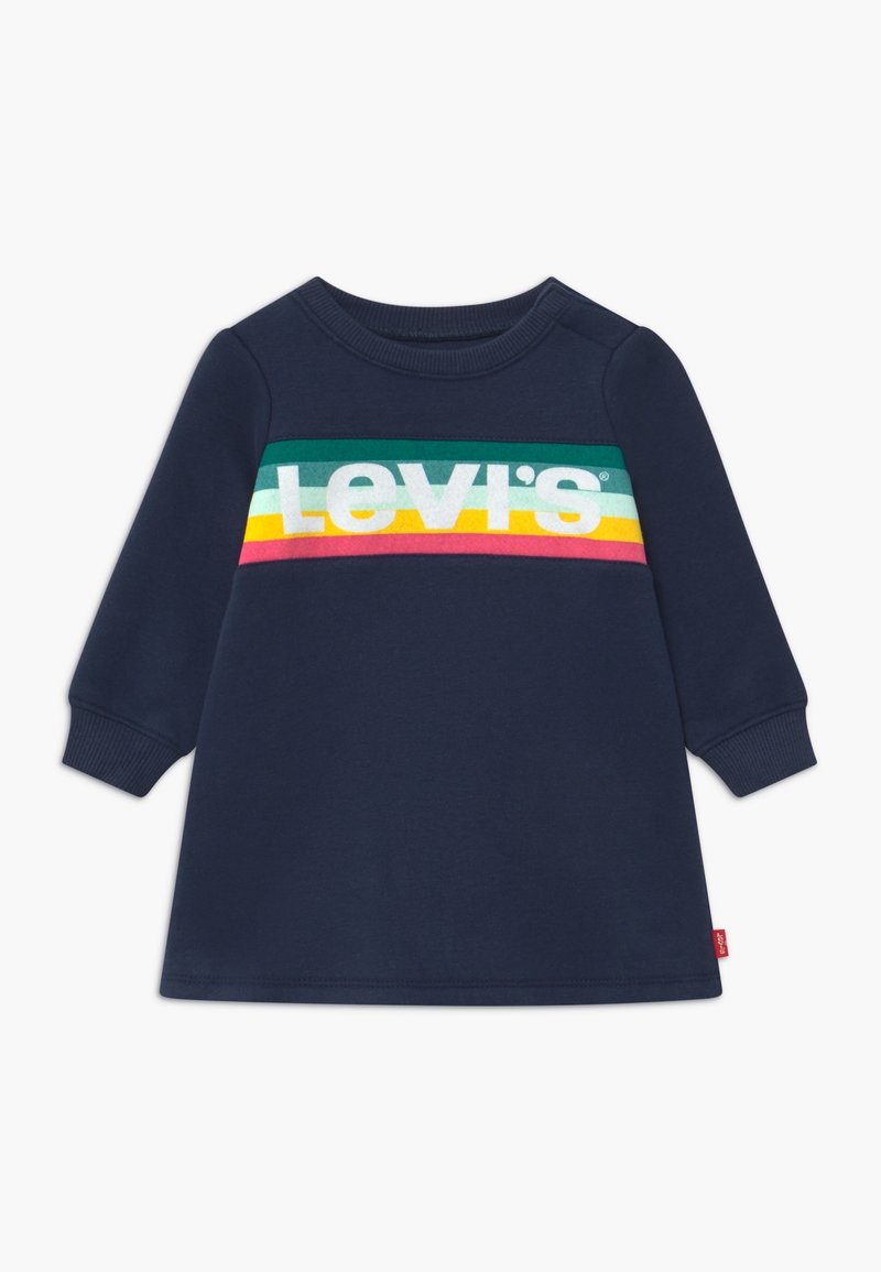 Robe pour tout-petit à manches longues bleu marine avec des poignets côtelés, présentant des rayures vertes, bleu clair, jaunes et roses sur la poitrine ainsi que le logo Levi's blanc.