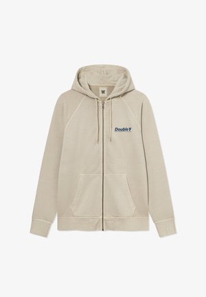 Bež jopica z zadrgo in kapuco, raglan rokavi, dvema sprednjima žepoma in modrim logotipom "Double V" na levi prsni strani. Mehka tekstura tkanine.