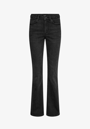 Jeans de mezclilla negros de corte acampanado con una textura trenzada en la cintura, que cuentan con cinco bolsillos y costuras contrastantes.