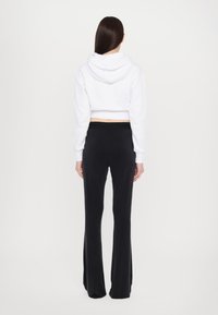Versace Jeans Couture Leggings - Trousers - black