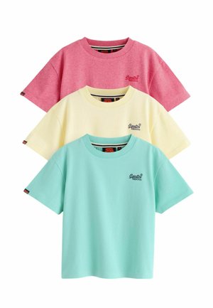 Three short-sleeve crew neck T-shirts stacked, in pink, pale yellow, and light blue, each with small logo text on the left chest.