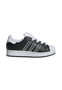 Black leather sneaker with white rubber toe cap and sole, featuring three white stripes and white laces. Textured upper for grip.