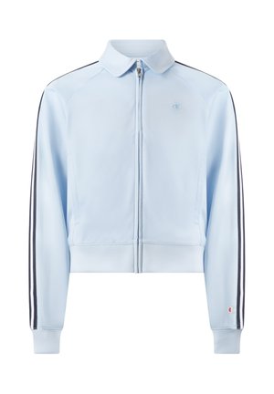 Jasnoniebieska bluza sportowa zapinana na zamek, z czarnymi paskami po bokach, ściągaczami na mankietach i dole oraz małymi logo Champion na piersi i rękawie.