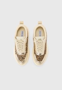 Cream-colored sneakers with leopard print, metallic gold accents, textured upper, and lace closure. Rubber sole and heel tab.