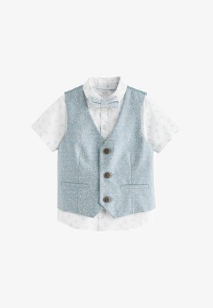Világoskék mellény, foltos mintával, három barna gombbal és két elülső zsebbel, fehér, rövidujjú ing felett, kék virágmintával.