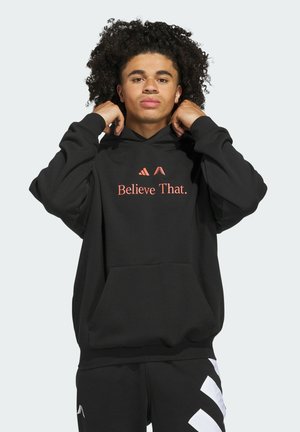 Black hoodie made of soft fabric featuring a kangaroo pocket and "Believe That." graphic in coral. Includes an adjustable drawstring hood.