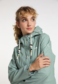 Schmuddelwedda Parkas - rauchmint