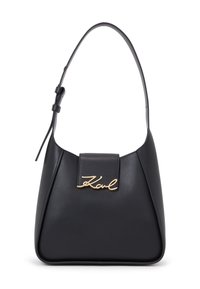 Black leather handbag with a curved shape, a short strap, and a gold signature logo on the front. Smooth texture, minimalist design.
