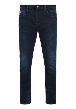 Jeans in denim blu scuro con vestibilità slim, dotati di un design a cinque tasche, leggeri segni di scolorimento vicino alle cosce e dettagli di cucitura in contrasto.