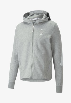 Hellgrauer Zip-up-Hoodie mit Fronttaschen, Kapuze, weißem Puma-Logo und Cloud9-Emblem auf der Brust.