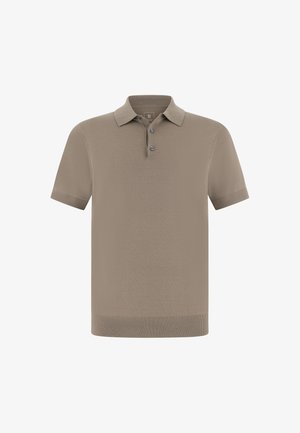 Polo en topo con acabado texturizado, mangas cortas y cuello. Cuenta con una tapeta de tres botones y puños acanalados.