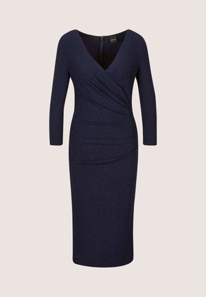 Navy blue dress with long sleeves and a V-neck, featuring a wrapped design and textured, slightly sparkly fabric. Zipper at the back.