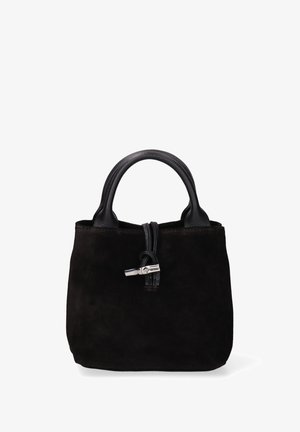 Borsa a mano in suede nero con manici in pelle nera liscia, caratterizzata da un accento argento e una forma arrotondata. Design compatto adatto all'uso quotidiano.