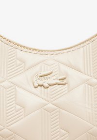 Lacoste SHOULDER BAG - Bolso de mano - bone white
