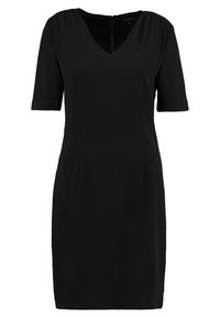 Svart kortärmad klänning med V-ringning och rak silhuett. Tillverkad av slät tyg, har en öppning bak och minimala sidoseam.