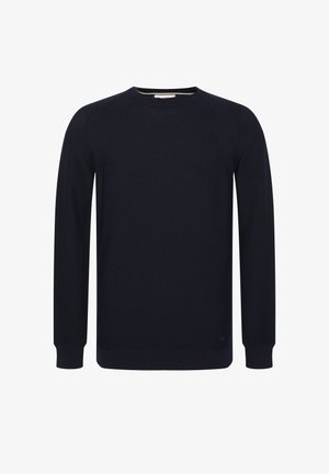 Tamsiai mėlynas megztinis su tekstūruotu raštu, apvaliu iškirpimu ir ilgomis rankovėmis. Yra raukšlių užbaigimas ant rankogalių ir apatinio krašto, suteikiantis prigludusį vaizdą.