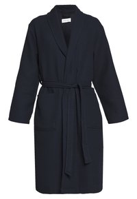 Dark navy waffle-textured robe with long sleeves, a shawl collar, and a matching belt. Features two front pockets for utility.
