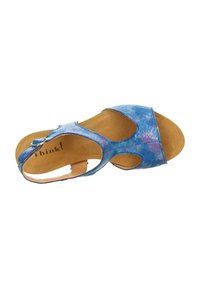 Blauer und lila gemusterter Sandale mit Ausschnitten, verstellbarem Riemen und Kork-Innensohle. Weiches Obermaterial und strukturierte Fußbett.