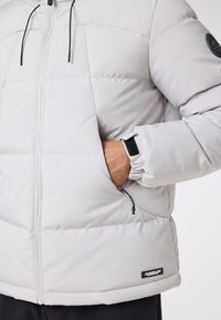 CLOSURE London RACER PUFFER - Jachetă de iarnă - stone