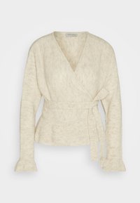 Pull portefeuille en maille beige clair avec manches longues, ceinture nouée à la taille et légers volants aux poignets et à l'ourlet.