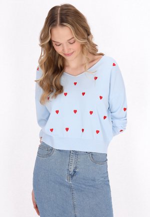 - Sweter