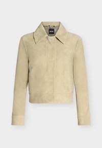 Sélectionné, dark beige