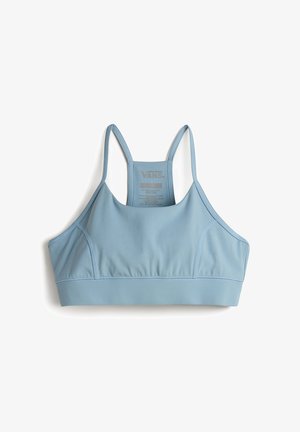 Top sportivo Vans blu chiaro con spalline regolabili, tessuto liscio e logo sul retro. Presenta un design aderente e cuciture minime.