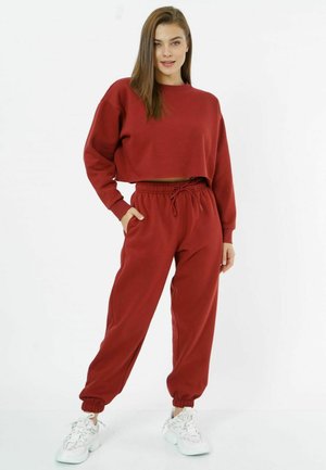 PASTEL - Tracksuit bottoms - burgundy