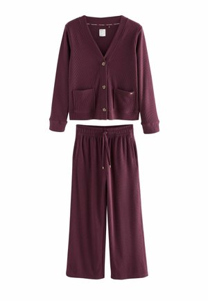 Burgundský loungewear set s texturovaným kardiganem se dvěma předními kapsami a odpovídajícími kalhotami s elastickým pasem a šňůrkou.
