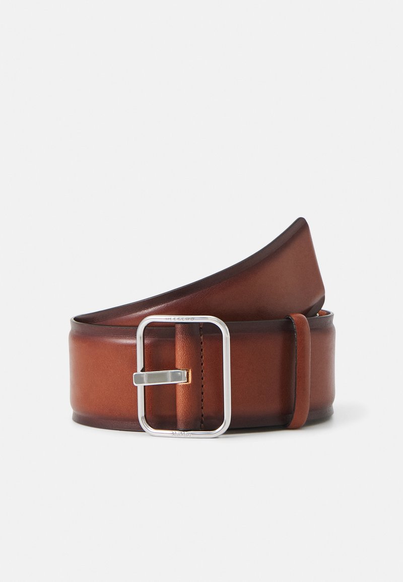 Pruun nahkne vöö sileda pinnaga, hõbedane metallklamber ja ristkülikukujuline kuju. Omab peenelt tikitud servi ja elegantset disaini.