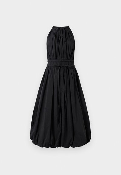 Black halter dress featuring a gathered bodice, cinched waist with a tie, and a voluminous skirt with a textured finish.