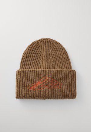Brown knitted beanie with ribbed texture and a folded cuff, featuring red embroidered logo on the front. Soft, lightweight material.