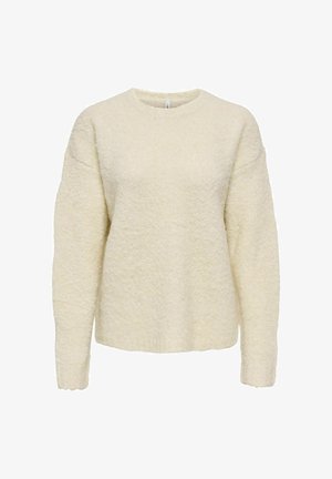 Krēmskrāsas adīts džemperis ar teksturētu apdari, apaļu kakla izgriezumu un nolaiātiem plecu šuvēm. Mīksta auduma ar ribinātu apdari pie piedurknēm.