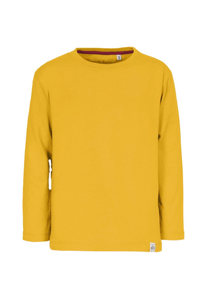 Pitkähihainen keltainen puuvillapaidan kanssa pyöreä kaula-aukko ja pieni logotagi vasemmassa alareunassa. Sileä pinta ja yksinkertainen muotoilu.