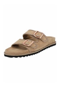 Beige Wildledersandalen mit zwei verstellbaren Riemen, großen rechteckigen Schnallen und einer schwarzen strukturierten Sohle. Mit dekorativer Naht entlang der Kanten.