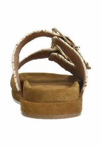 Tan suede sandals with a cushioned footbed and a textured strap. The strap features a cream and brown woven pattern and metal accents.