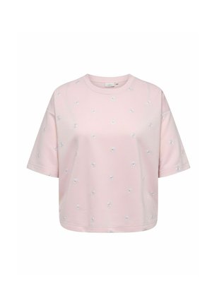 Lys rosa kortermet crop-top med små hvite og gule tusenfrydblomster trykt over hele.