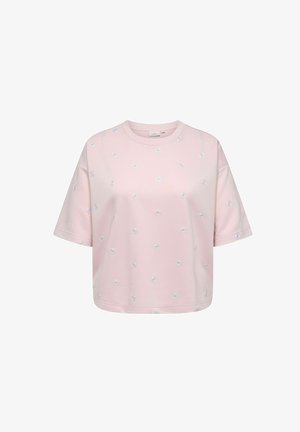 Lys rosa kortermet crop-top med små hvite og gule tusenfrydblomster trykt over hele.