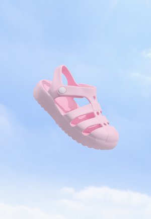 Crocs, CLASSIC FISHERMAN UNISEX - Ciabatte da mare - pink milk