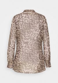 Long-sleeve satin blouse with brown and beige abstract animal print, pointed collar, and buttoned cuffs shown from the back.