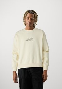 Jack & Jones JORBROOKLYN GRAPHIC CREW NECK - Felpa - antique white