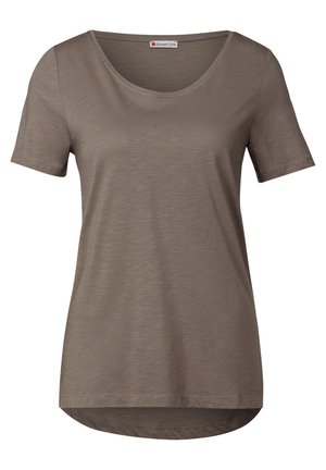 T-shirt a maniche corte e scollo rotondo in una tonalità di marrone tenue. Tessuto morbido e testurizzato con orlo leggermente curvo, caratterizzato da una lucentezza sottile.