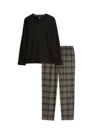 Camisa negra de manga larga combinada con pantalones de cuadros grises con cintura elástica y un corte relajado. Textura de tela suave en todo el conjunto.