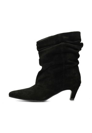 Black suede ankle boot with a low kitten heel and slouched shaft design.